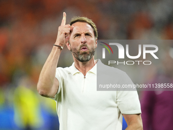 Gareth Southgate head coach of England celebrates victory after the UEFA EURO 2024 semi-final match between Netherlands and England at Footb...