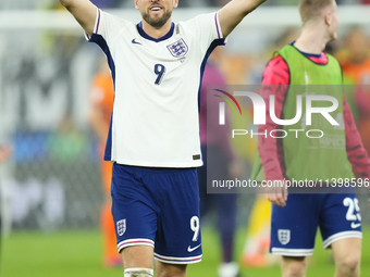 Harry Kane centre-forward of England and Bayern Munich celebrates victory after the UEFA EURO 2024 semi-final match between Netherlands and...