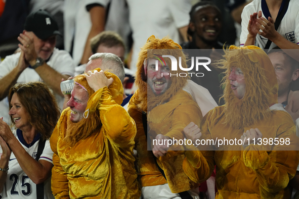 English supporters celebrate victory after the UEFA EURO 2024 semi-final match between Netherlands and England at Football Stadium Dortmund...