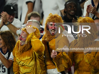 English supporters celebrate victory after the UEFA EURO 2024 semi-final match between Netherlands and England at Football Stadium Dortmund...