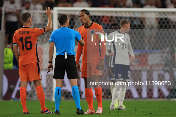 Virgil van Dijk (Netherlands) is confronting the ref during the Semi Final of the UEFA European Championship between England and Netherlands...