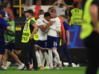 Ollie Watkins (England) is being congratulated by Cole Palmer (England) after the Semi Final of the UEFA European Championship between Engla...