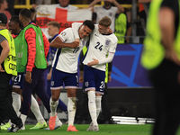 Ollie Watkins (England) is being congratulated by Cole Palmer (England) after the Semi Final of the UEFA European Championship between Engla...