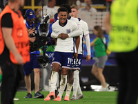 Ollie Watkins (England) is being congratulated by Kobbie Mainoo (England) after the Semi Final of the UEFA European Championship between Eng...