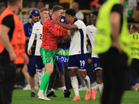 Ollie Watkins (England) is being congratulated by Dean Henderson (England) after the Semi Final of the UEFA European Championship between En...