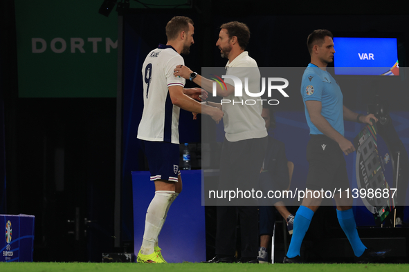 Harry Kane (England) is being substituted for Ollie Watkins (England) during the Semi Final of the UEFA European Championship between Englan...