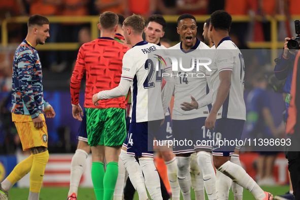 Ollie Watkins (England) is being congratulated by Aston Villa teammate Ezri Konsa (England) after the Semi Final of the UEFA European Champi...