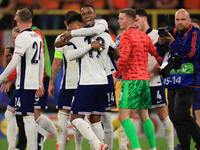 Ollie Watkins (England) is being congratulated by Aston Villa teammate Ezri Konsa (England) after the Semi Final of the UEFA European Champi...