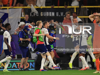 Harry Kane (England) is reacting to the final whistle and celebrating with Ollie Watkins (England) after the Semi Final of the UEFA European...