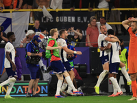 Harry Kane (England) is reacting to the final whistle and celebrating with Ollie Watkins (England) after the Semi Final of the UEFA European...