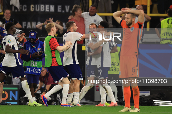 Harry Kane (England) is reacting to the final whistle and celebrating with Ollie Watkins (England) after the Semi Final of the UEFA European...