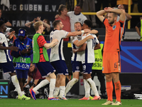 Harry Kane (England) is reacting to the final whistle and celebrating with Ollie Watkins (England) after the Semi Final of the UEFA European...