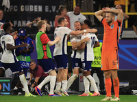 Harry Kane (England) is reacting to the final whistle and celebrating with Ollie Watkins (England) after the Semi Final of the UEFA European...