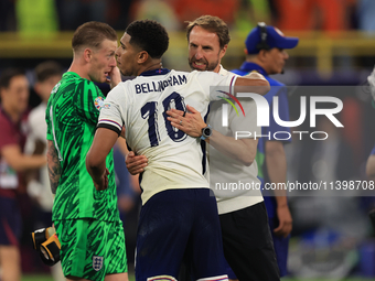 Gareth Southgate, England manager, is with Jude Bellingham (England) after the Semi Final of the UEFA European Championship between England...