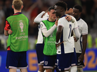 Phil Foden (England) is with Bukayo Saka (England) after the Semi Final of the UEFA European Championship between England and Netherlands in...