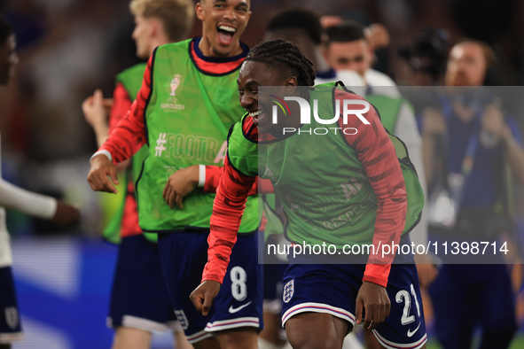 Eberechi Eze (England) is laughing with Trent Alexander-Arnold (England) after the Semi Final of the UEFA European Championship between Engl...