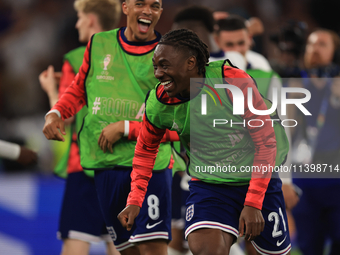 Eberechi Eze (England) is laughing with Trent Alexander-Arnold (England) after the Semi Final of the UEFA European Championship between Engl...