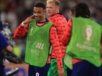 Eberechi Eze (England) is laughing with Trent Alexander-Arnold (England) after the Semi Final of the UEFA European Championship between Engl...