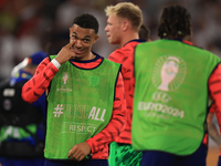 Eberechi Eze (England) is laughing with Trent Alexander-Arnold (England) after the Semi Final of the UEFA European Championship between Engl...