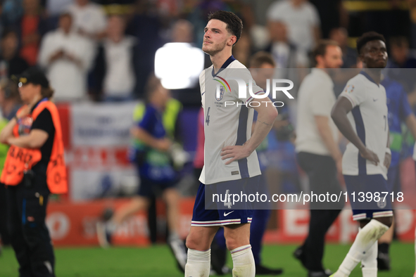 Declan Rice (England) is taking in the fans singing ''Three Lions'' after the Semi Final of the UEFA European Championship between England a...