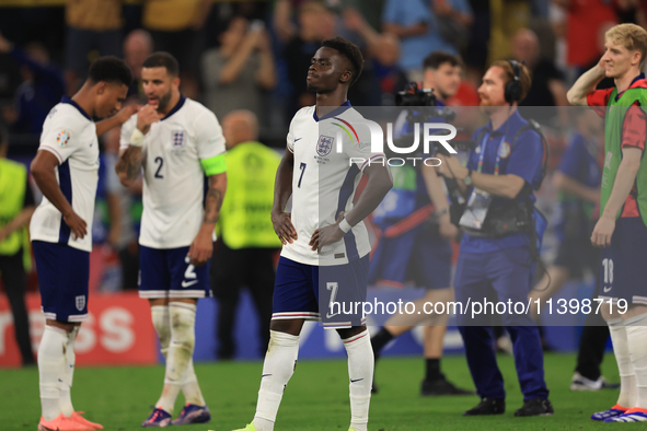 Bukayo Saka (England) is taking in the fans singing ''Three Lions'' after the Semi Final of the UEFA European Championship between England a...