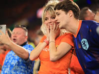 Dutch fans are looking crestfallen after the Semi Final of the UEFA European Championship between England and Netherlands at the BVB Stadion...