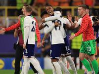 Ollie Watkins (England) is being congratulated by Aston Villa teammate Ezri Konsa (England) after the Semi Final of the UEFA European Champi...