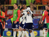 Ollie Watkins (England) is being congratulated by Aston Villa teammate Ezri Konsa (England) after the Semi Final of the UEFA European Champi...