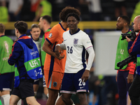 Kobbie Mainoo (England) is commiserating with Joshua Zirkzee (Netherlands) after the Semi Final of the UEFA European Championship between En...