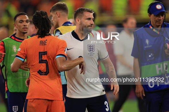 Luke Shaw (England) is commiserating with Nathan Ake (Netherlands) after the Semi Final of the UEFA European Championship between England an...