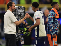 Gareth Southgate, England manager, is with Jude Bellingham (England) after the Semi Final of the UEFA European Championship between England...