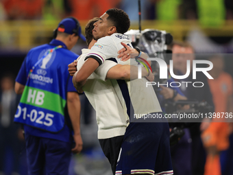 Gareth Southgate, England manager, is with Jude Bellingham (England) after the Semi Final of the UEFA European Championship between England...