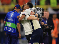 Gareth Southgate, England manager, is with Jude Bellingham (England) after the Semi Final of the UEFA European Championship between England...