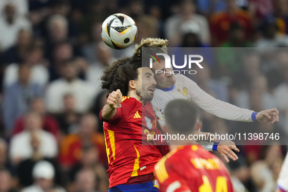 Marc Cucurella left-back of Spain and Chelsea FC and Antoine Griezmann centre-forward of France and Atletico de Madrid compete for the ball...