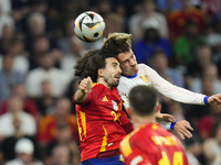 Marc Cucurella left-back of Spain and Chelsea FC and Antoine Griezmann centre-forward of France and Atletico de Madrid compete for the ball...