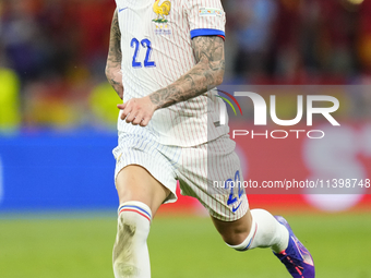 Theo Hernandez eft-back of France and AC Milan during the UEFA EURO 2024 semi-final match between Spain v France at Munich Football Arena on...