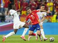 Mikel Oyarzabal centre-forward of Spain and Real Sociedad and William Saliba centre-back of France and Arsenal FC compete for the ball durin...