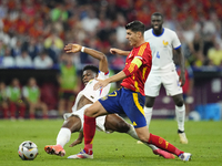 Alvaro Morata centre-forward of Spain and Atletico de Madrid and Aurelien Tchouameni defensive midfield of France and Real Madrid compete fo...