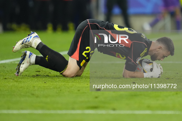 Unai Simon goalkeeper Athletic Club Bilbao makes a save during the UEFA EURO 2024 semi-final match between Spain v France at Munich Football...