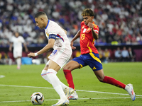 Kylian Mbappe centre-forward of France and Real Madrid and Lamine Yamal right winger of Spain and FC Barcelona during the UEFA EURO 2024 sem...