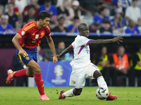 Rodrigo Hernandez defensive midfield of Spain and Manchester City and N'Golo Kante defensive midfield of France and Al-Ittihad Club compete...