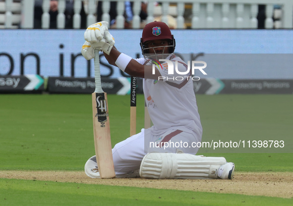 Kavem Hodge of West Indies is getting caught by England's Ollie Pope (Surrey) during the Rothesay Test on Day 1 of the 5-match series betwee...