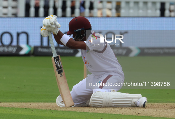 Kavem Hodge of West Indies is getting caught by England's Ollie Pope (Surrey) during the Rothesay Test on Day 1 of the 5-match series betwee...