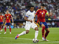 Alvaro Morata centre-forward of Spain and Atletico de Madrid and Jules Kounde centre-back of France and FC Barcelona compete for the ball du...