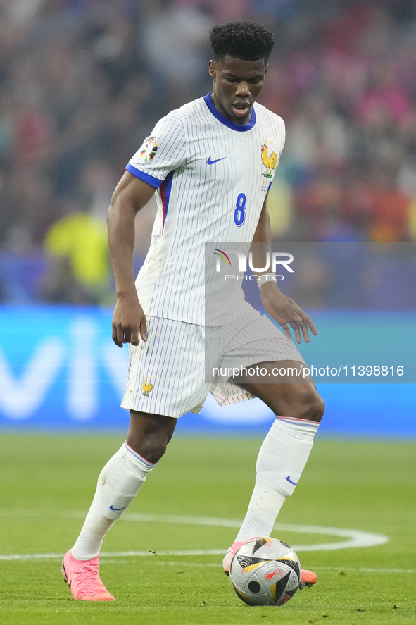 Aurelien Tchouameni defensive midfield of France and Real Madrid controls the ball during the UEFA EURO 2024 semi-final match between Spain...