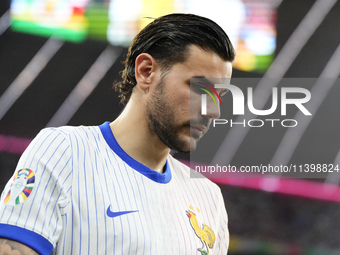 Theo Hernandez eft-back of France and AC Milan during the UEFA EURO 2024 semi-final match between Spain v France at Munich Football Arena on...