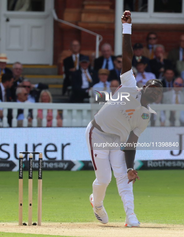 Jayden Seales of West Indies is in action during the Rothesay Test on Test Day 1 of the 5-match series between England and West Indies at Th...