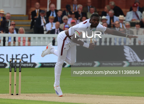 Jayden Seales of West Indies is in action during the Rothesay Test on Test Day 1 of the 5-match series between England and West Indies at Th...