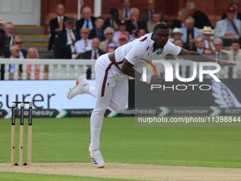 Jayden Seales of West Indies is in action during the Rothesay Test on Test Day 1 of the 5-match series between England and West Indies at Th...