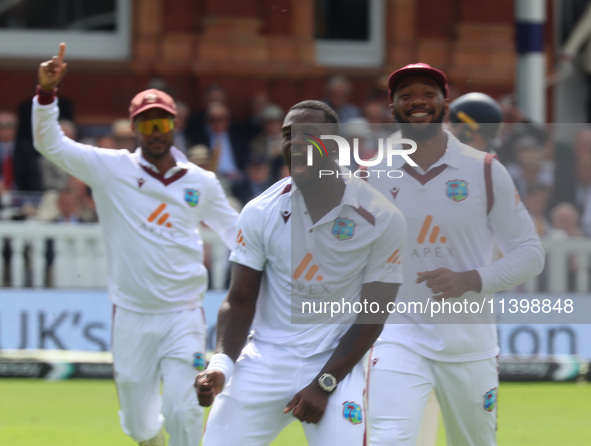 Jayden Seales of West Indies is celebrating the wicket of England's Ben Duckett, caught by Joshua Da Silva of West Indies, during the Rothes...